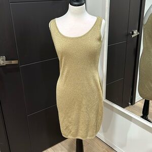 Beige/gold color. Size small.